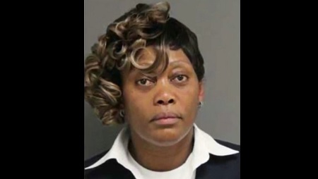 A woman driving a Peter Pan bus was arrested after locking a woman in the luggage compartment of the bus on Sunday evening.
