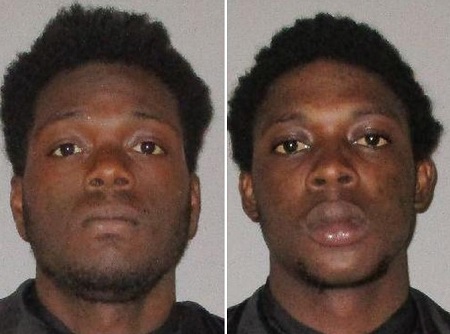 Two men arrested for pointing guns at a McDonald's cashier over cold burgers.