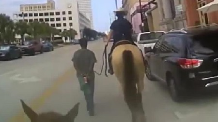 Bodycam of Texas officers on Horseback leading black man by rope released.