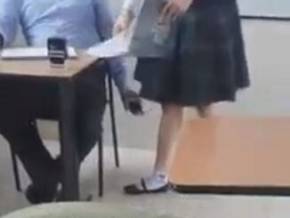 Teacher caught filming under students skirt.