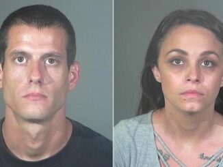 Couple arrested for hate crimes after attacking car with a shovel.