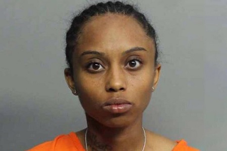 Woman arrested after she accidentally shot her sister in the head.