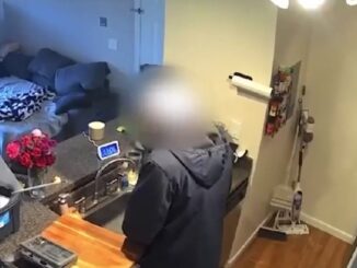 Urinating in his Kitchen Sink