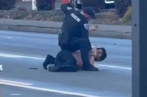 Auburn Police Officer Placed On Leave After Viral Video Appears To Show Him Punching Man Around 20 Times.